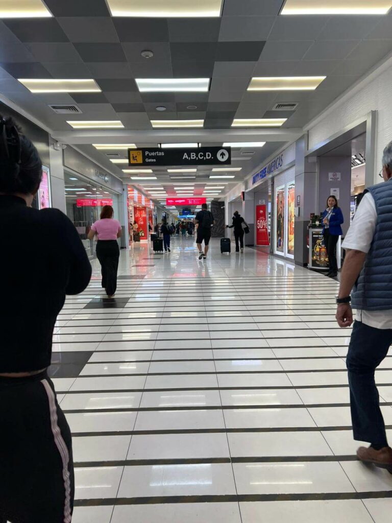 Walking inside terminal El Salvador Airport